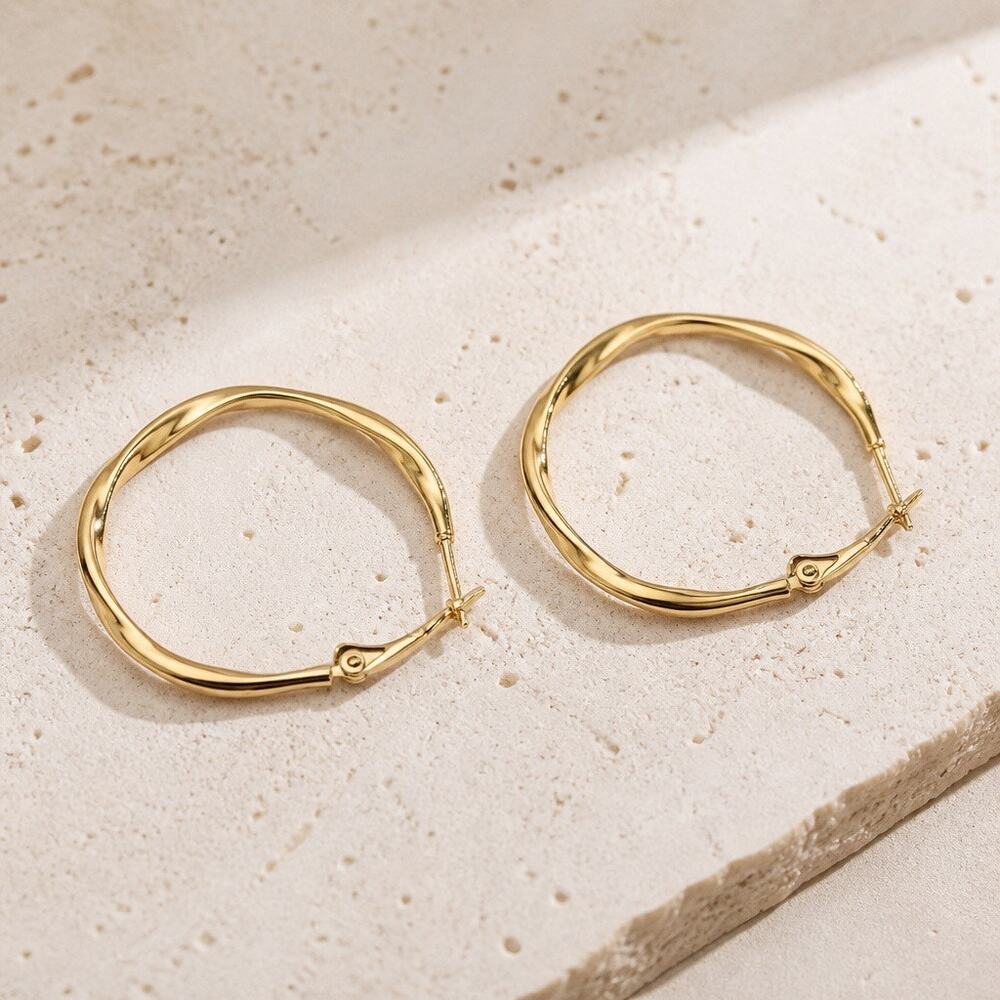The Solis Hoops 18K Gold Plated Wave Hoop Earrings –